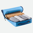 Eagle Creek Pack-It™ Starter Set Blue Dawn - Isolate Cube M - pakket med sammenrullet tøj