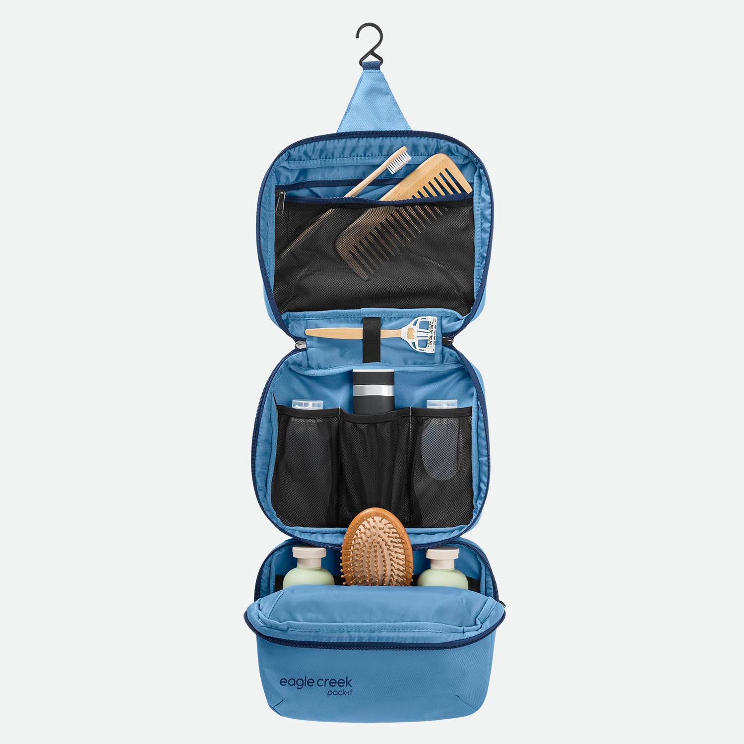 Eagle Creek Pack-It™ Trifold Toiletry Kit Blue Dawn - indvendigt design, pakket med toiletsager